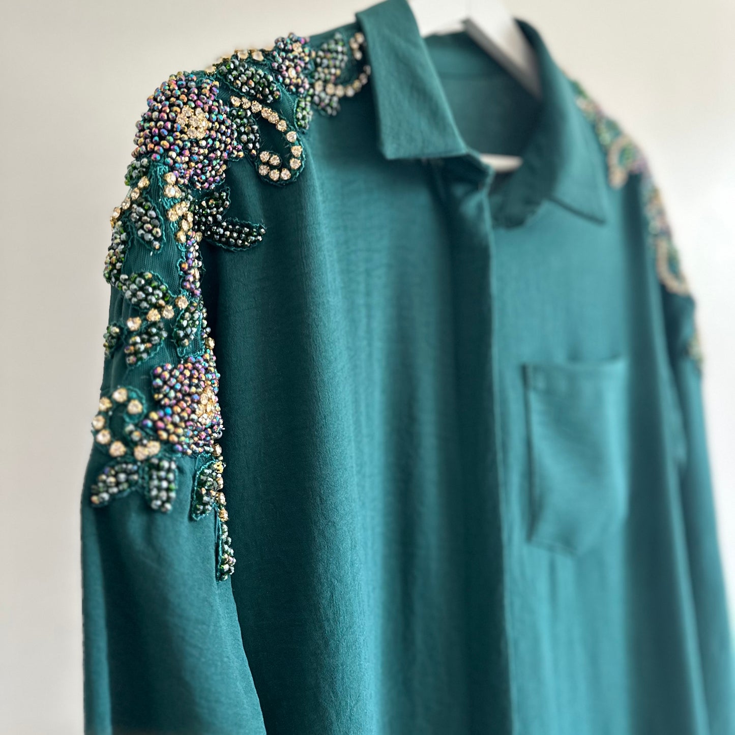 Green embellished shirt